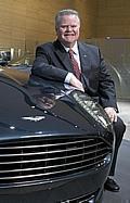 Jim Padilla, President and Chief Operating officer, Ford Motor Company with the Aston Martin Rapide concept vehicle at the 2006 North American International Auto show in Detroit.